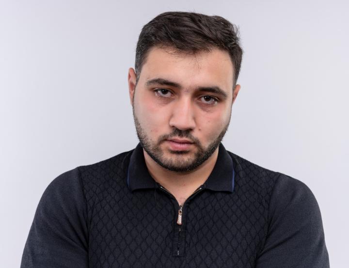 CV photo of a man not smiling
