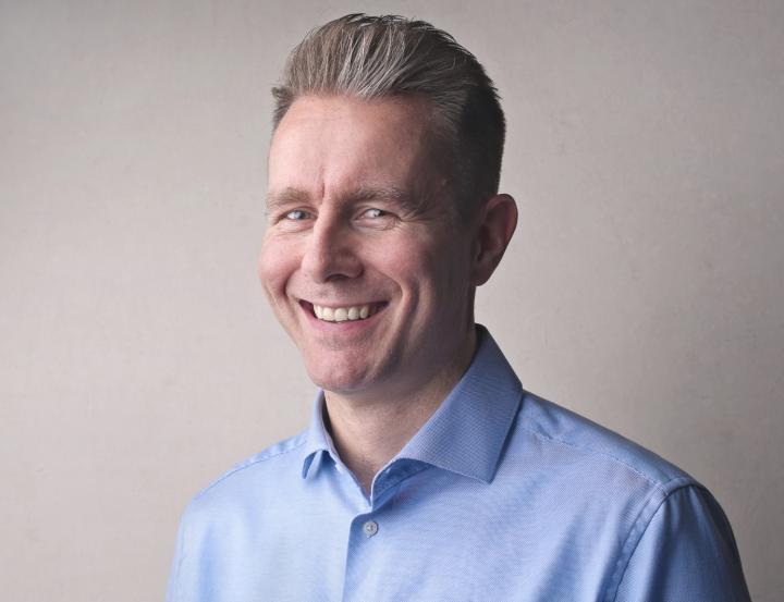 CV photo of a man smiling